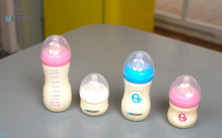 در عکس های سایت یومامی برخی شیشه‌های شیر بدون درب مشاهده می شوند آیا این محصولات درب ندارند؟